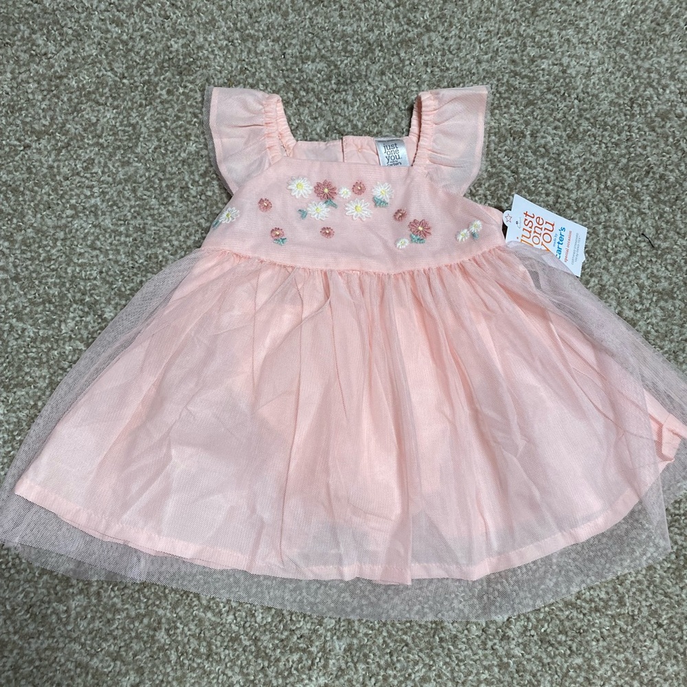 Pink beautiful dress by Carter’s.